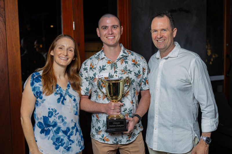 Gympie Web Design owner Rhys Everitt accepting 2025 Graduate of the year for E-Business Institute from Matt and Liz Raad